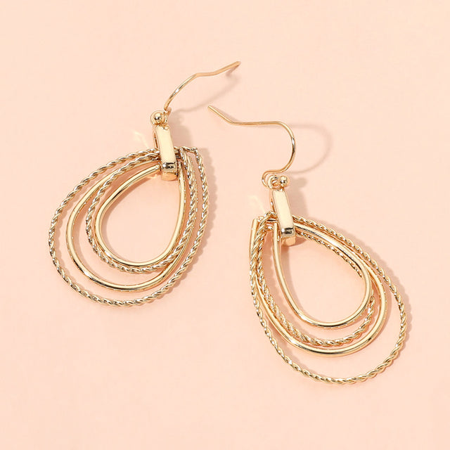 Madeline Love Gold Textured Metal Multi Layerd Wire Open Teardrop Earrings
