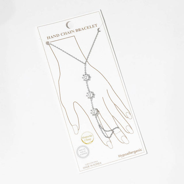 Madeline Love Rhodium, White White Gold Dipped CZ Pearl Flower Link Hand Chain Magnetic Bracelet - Body Jewelry