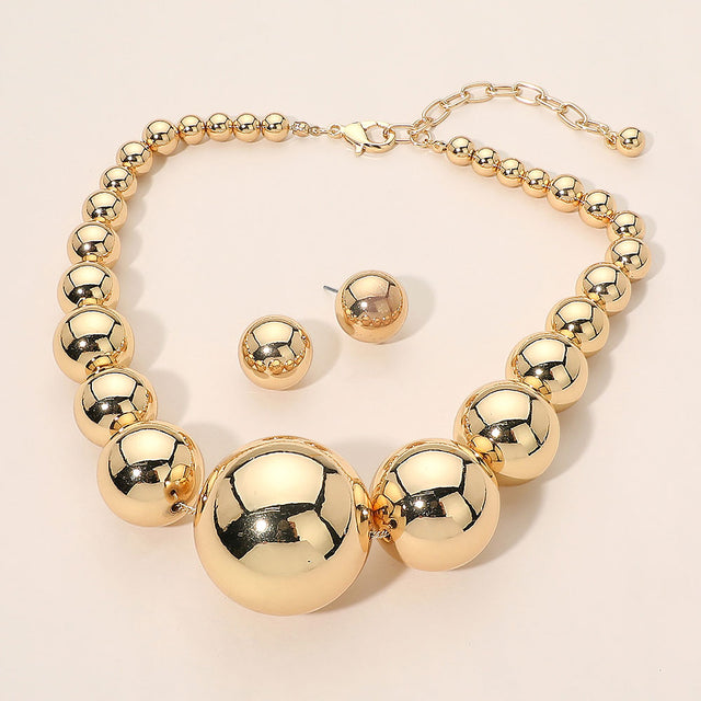 Madeline Love Gold Oversized Graduated Metal Ball Beaded Statement Necklace