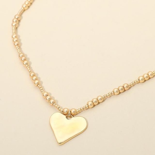 Madeline Love Gold Brushed Hammered Metal Heart Pendant Beaded Chain Necklace - Necklaces