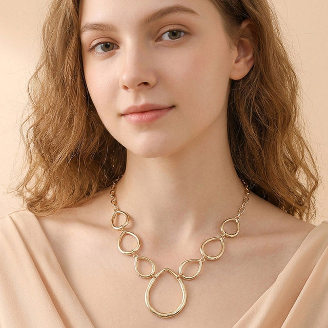 Madeline Love Gold Geometric Open Metal Teardrop Link Statement Necklace