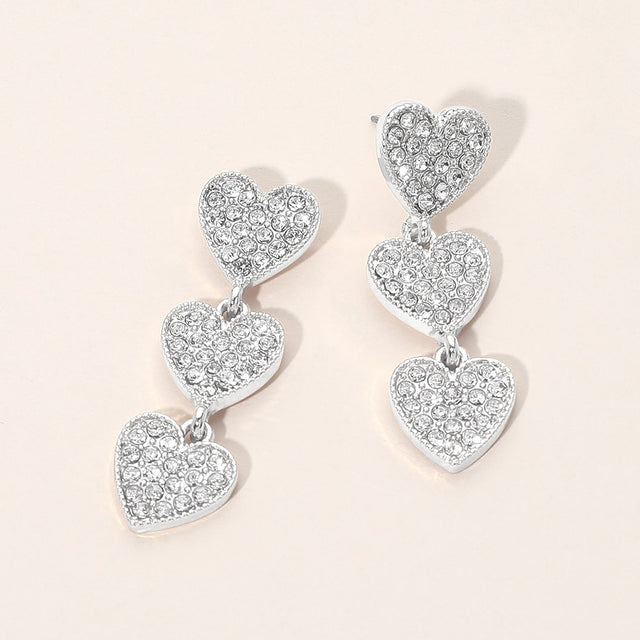 Madeline Love Clear, Rhodium Silver Dipped Rhinestone Pave Triple Heart Link Drop Earrings