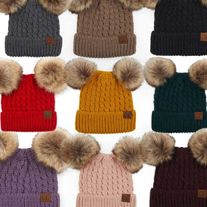 C.C Double Pom Pom All Over Cable Knit Beanie Hat., Stay warm and cozy this winter. Expertly crafted from a premium cable knit fabric, this stylish beanie provides maximum insulation and breathability. Two pom poms on top add a touch of flair to your look. Perfect for chilly winter days, this is an ideal winter gift. 
