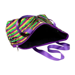 Mardi Gras Stripe Sequin Tote Shoulder Bag is perfect for adding a touch of fun and sparkle to your outfit. With its vibrant stripes and shimmering sequins, it's sure to turn heads. The spacious tote design allows you to carry all your essentials comfortably, making it ideal for everyday use or special occasions.