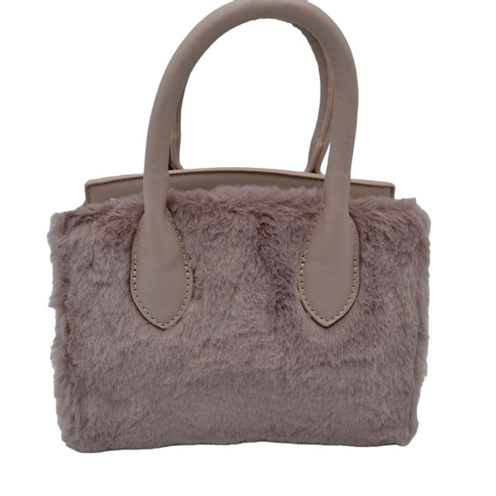Mauve Cozy up to our Taupe Faux Fur and Vegan Leather Small Tote Crossbody Bag adjustable strap, Faux Fur Pom Pom Keychain! This bag is the perfect blend of style and comfort. This cuddly accessory provides an easy way to carry around your favorite things without compromising on looks. Goes from work to play in a snap!