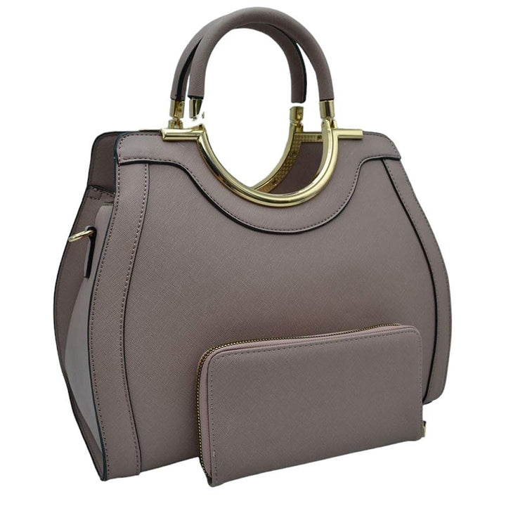 Mauve Faux Leather Round Top Handle Tote Bag With Wallet, is stylish and functional. Crafted from high-quality faux leather, this bag features a round top handle for easy carrying. The included wallet provides you with a secure place to store small items. Keep your belongings safe and look fashionable at the same time.