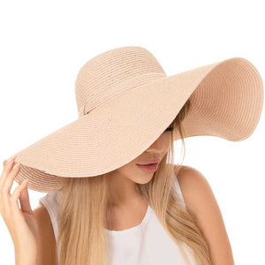 Mauve Solid Floppy Straw Sun Hat, Stay stylish and protected from the sun with our sun hats! Made from high-quality straw, this hat is perfect for any sunny day. Its floppy design not only looks fashionable but also provides ample shade for your face and neck. Don't forget to pack this accessory for your next beach trip!