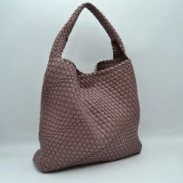 Mauve This chic, slouchy shoulder bag features an intricate basket-weave design in a creamy off-white tone, offering a highly textured and relaxed silhouette for stylish everyday use. It is crafted with an integrated wide, woven top handle that extends seamlessly from the main body panels for comfortable over-the-shoulder carrying. The spacious open-top main compartment provides effortless access to your items and comes complete with a matching
