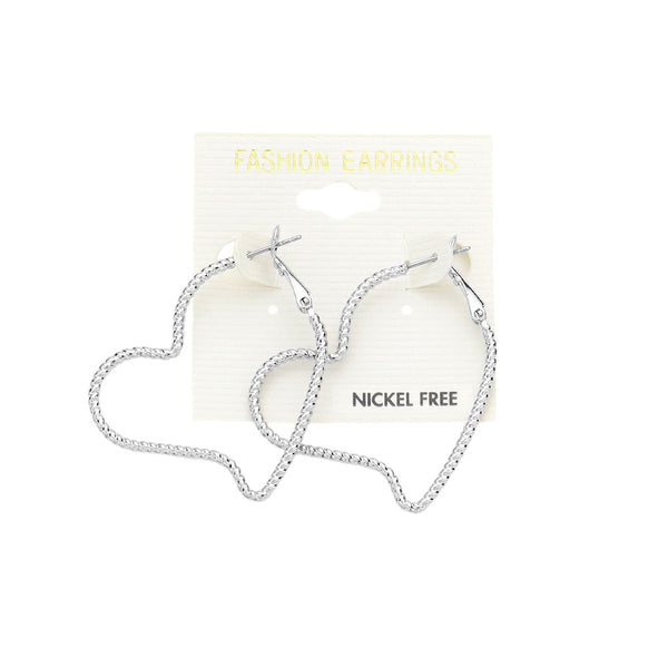 Metal Heart Hoop Earrings are a stylish addition to any outfit. Made of a durable metal, they are solid and long-lasting. With their heart-shaped design, they add a touch of romance to any look. Perfect for a date night or a day at the office. 