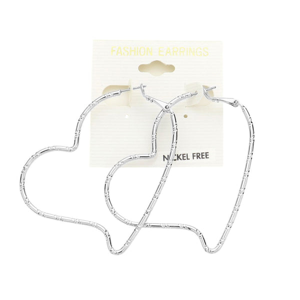 Metal Heart Hoop Earrings are crafted with high-quality metal, perfect for adding a touch of elegance to any outfit. Lightweight and comfortable to wear, these earrings feature a unique heart design that will surely catch the attention of others. Add a stylish touch to your look with these stunning earrings. 