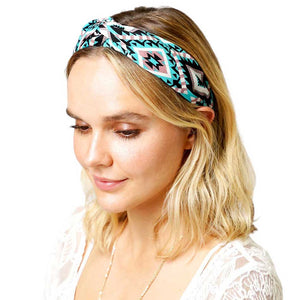Mint Aztec patterned twisted headband is expertly designed to elevate your style while keeping your hair in place. Made with high-quality materials, it provides both functionality and fashion, giving you the best of both worlds. With its unique twisted design, this headband is perfect for any occasion.