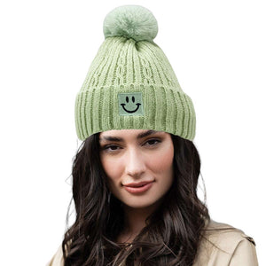 Mint Fleece Lining Smile Pointed Pom Pom Beanie Hat, Stay warm and stylish with this hat. Wear it on a cold winter day or as a fashion statement. Perfect for chilly winter days. Warming gift item for teenagers, fashion enthusiasts, co-workers, friends & family members, and yourself.