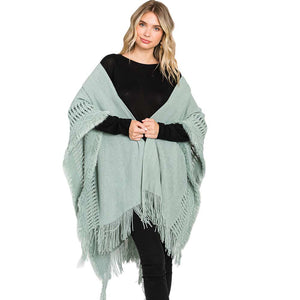 Mint Fringe Cut Out Knit Ruana Poncho, with the latest trend in ladies' outfit cover-up! the high-quality knit poncho is soft, comfortable, and warm but lightweight. It's perfect for your daily, casual, party, evening, vacation, and other special events outfits. A fantastic gift for your friends or family.