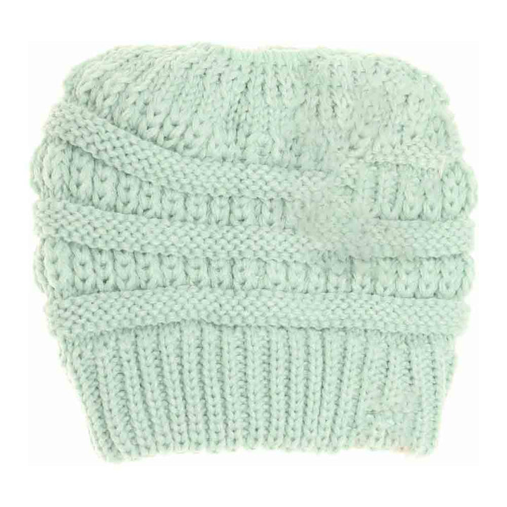 Mint Kids Solid Classic CC Beanie Tail combines timeless style with practical comfort. Designed with a soft, durable fabric, it provides warmth while allowing a ponytail or bun to fit through the open tail hole comfortably. Ideal for active children, this beanie ensures a secure and cozy fit during outdoor activities in cooler weather. Its solid color and classic design make it versatile for everyday wear or layering under helmets and hoods.