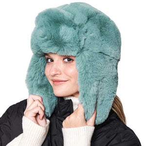 Mint Solid Faux Fur Trapper Hat, is perfect for winter outdoor adventures. Crafted from soft faux fur, the hat will comfortably protect your head from the cold while looking stylish. With its windproof design, this hat is a must-have for winter weather. Ideal gift for your friends and family members on colder days.