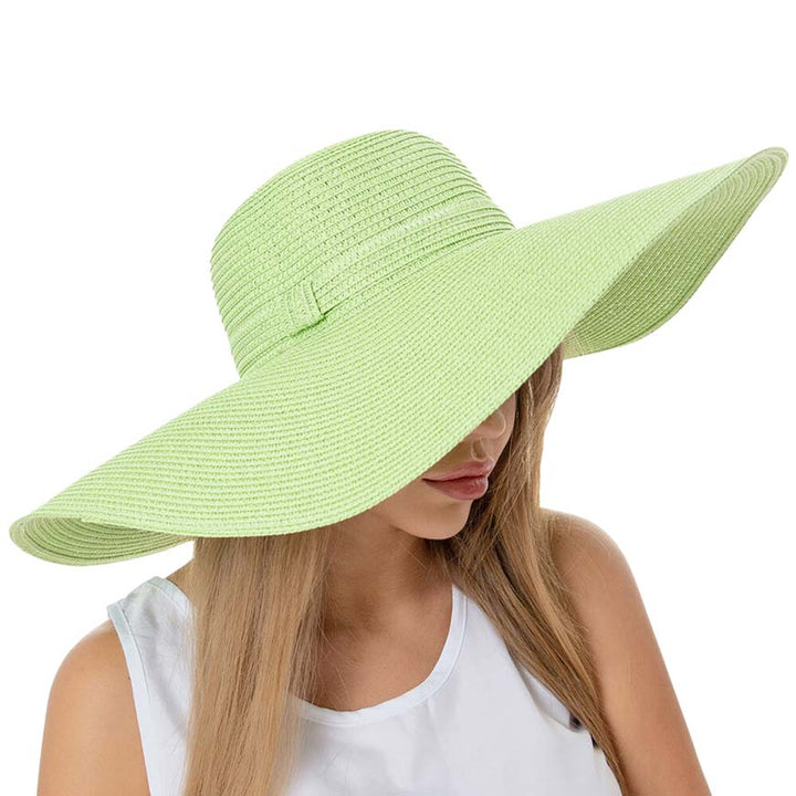 Mint Solid Floppy Straw Sun Hat, Stay stylish and protected from the sun with our sun hats! Made from high-quality straw, this hat is perfect for any sunny day. Its floppy design not only looks fashionable but also provides ample shade for your face and neck. Don't forget to pack this accessory for your next beach trip!