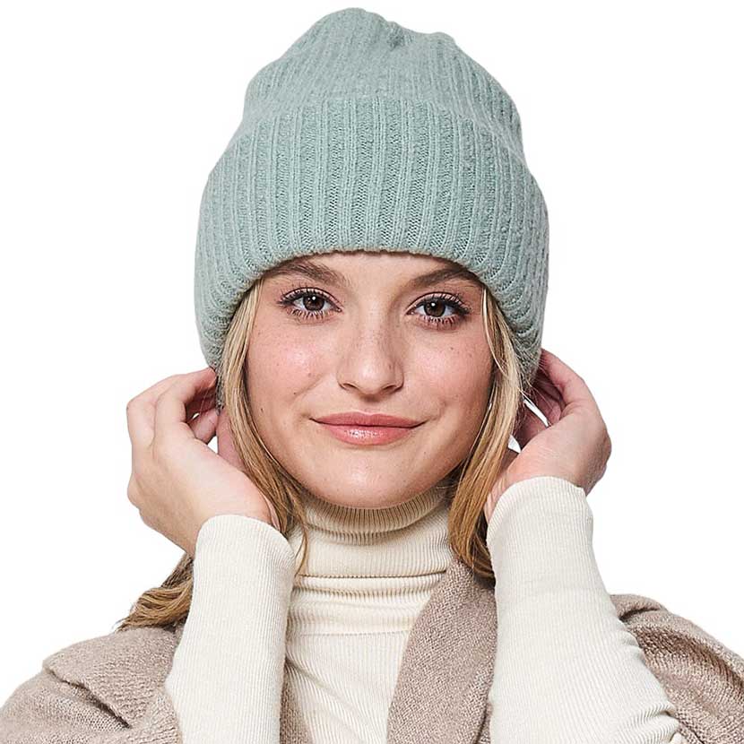 Mint Solid Knitted Beanie Hat, is crafted with a soft Acrylic material, making it lightweight and comfortable. Its ribbed-knit construction delivers warmth and protection in cool weather. Its one-size-fits-all design makes it a great gift choice for men, women, or children.
