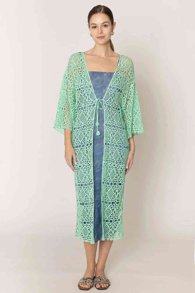 Mint Effortless layering meets timeless style with this Solid Crochet Cardigan. Crafted from 100% cotton, it offers breathable comfort perfect for any season. The open-weave crochet design adds texture and visual interest while remaining lightweight and versatile. Pair it over dresses, tees, or tanks for an instantly polished look.