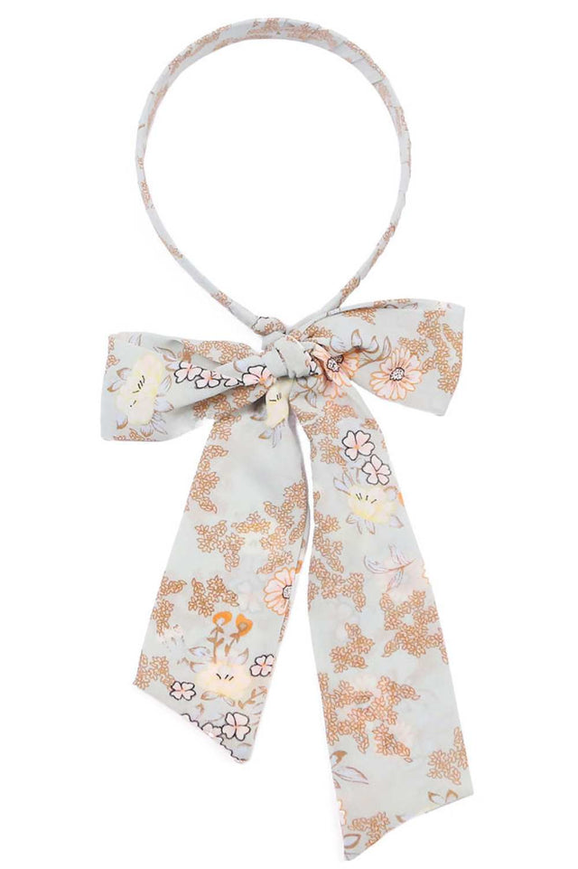 Mint Elevate your everyday look with this charming floral print headband featuring an integrated ponytail design. Crafted from 100% polyester, it offers a comfortable, lightweight fit that works for any occasion from casual outings to active days. The vibrant floral pattern adds a touch of feminine style while keeping your hair neatly secured. One size fits most, making it a versatile accessory for anyone seeking effortless elegance and practicality.