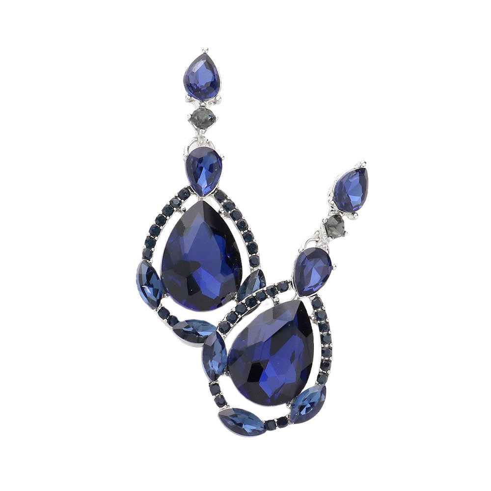 Montana Blue Crystal Rhinestone Teardrop Evening Earrings, are beautifully crafted with glimmering crystal rhinestones and a teardrop design that adds elegance and charm to your look. They are the perfect accessory for adding a touch of glamour to any special occasion. A quintessential gift choice for loved ones on any special day.