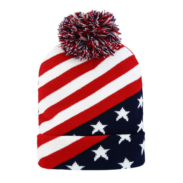 Multi Celebrate your patriotic spirit with this bold knit beanie featuring diagonal red and white stripes paired with a classic star pattern. Finished with a festive pom-pom, it’s the perfect cozy accessory for holidays, outdoor events, or adding all-American style to your cold-weather outfits.