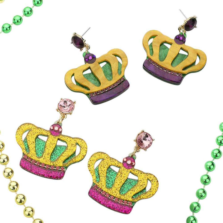 Multi-2-Glittered resin Mardi Gras crown dangle earrings are the perfect accessory for any festive celebration. The colorful and sparkly design will add a touch of fun and glamour to your outfit, making you stand out and feel like a true queen. Made with high-quality materials, these earrings are durable and lightweight, ensuring long-lasting wear without weighing you down. 