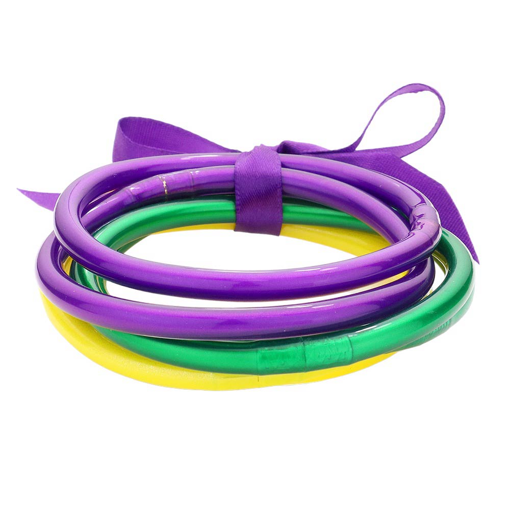 Multi 6PCS Mardi Gras Glitter Jelly Tube Bangle Bracelets, make a perfect accessory for celebrating Mardi Gras in style. With their vibrant colors and glittery design, these bracelets are sure to catch the eye and make your party stand out. Celebrate Mardi Gras with these bracelets and gift them to your loved ones.