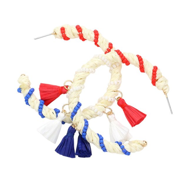 Multi American USA Flag earrings demonstrate advanced compositional techniques through precisely calibrated hoops supporting density-optimised raffia tassels. The seed bead integration follows a calculated geometric pattern that maximises visual impact while maintaining ideal weight distribution. The proprietary wrapping methodology creates structural reinforcement at critical junctures without compromising the kinetic properties essential to the tassel design.