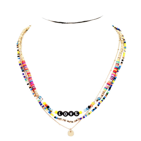 Multi-Color Bead Statement Love Layered Necklace is the perfect accessory to add a touch of fun and color to any outfit. The layered design adds depth and dimension, while the eclectic mix of beads creates a unique, eye-catching look. Elevate your style with this love-inspired necklace.