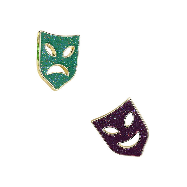 Multi-Dress up your Mardi Gras outfit with our Glittered Enamel Mask Stud Earrings. The colorful design will add a festive touch, while the glittered enamel will catch the light and make you shine. Perfect for any celebration! 