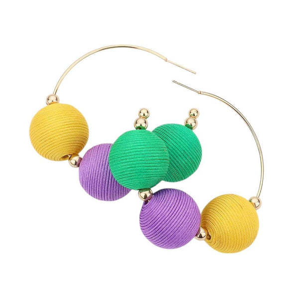 Multi-Mardi Gras Thread Ball Accented Hoop Earrings add a festive touch to any outfit. Featuring colorful thread balls and classic hoop design, they are perfect for celebrating and elevating your style. Made with high-quality materials, these earrings are a must-have for any Mardi Gras celebration.