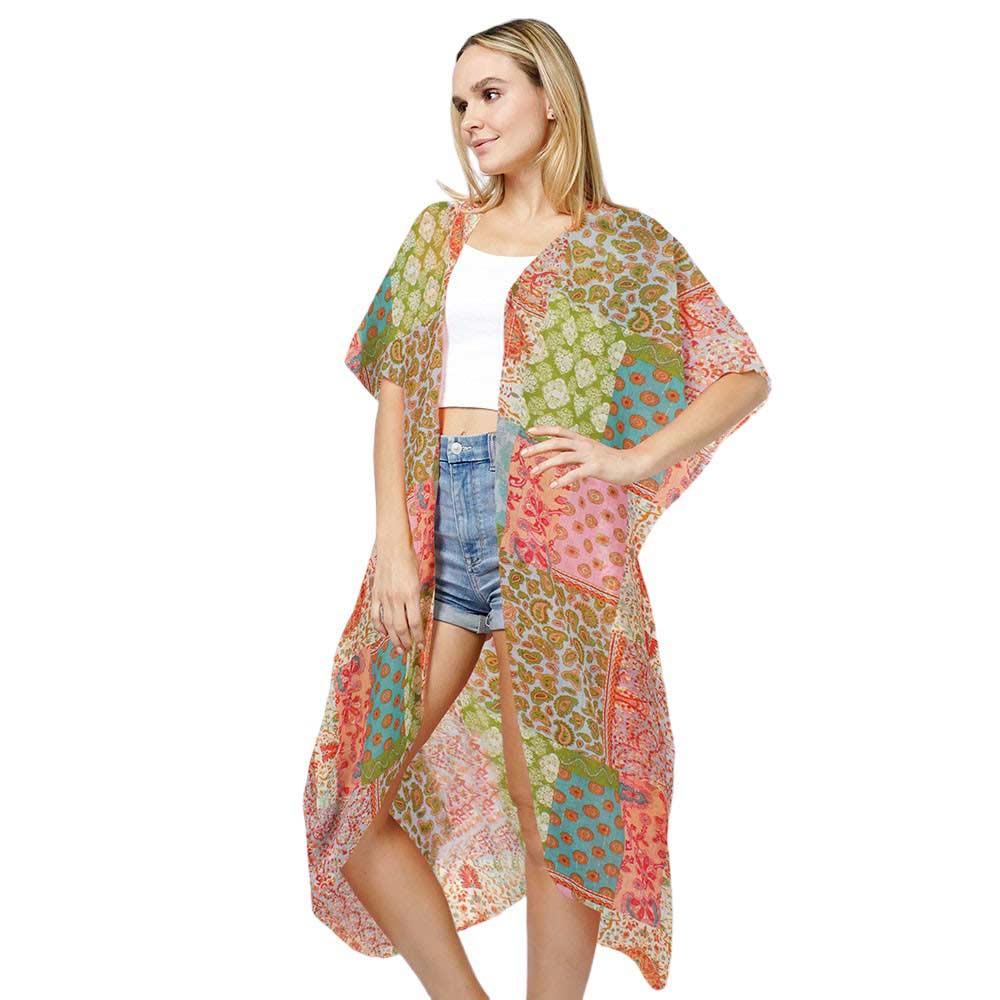 Multi Patchwork Print Lurex Kimono Poncho, Made from high-quality materials, this poncho features a unique patchwork print and shimmering lurex details. Perfect for adding a touch of glamour to any outfit, while also providing comfort and warmth. Experience the best of fashion and function with our kimono poncho.