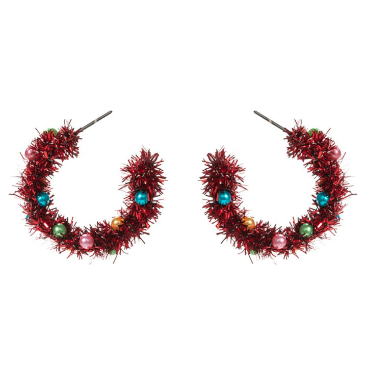 Celebrate the season with these festive tinsel hoop earrings, decorated with miniature ornament accents for a cheerful holiday touch. Lightweight and eye-catching, they’re perfect for adding playful flair to party outfits, winter gatherings, or seasonal celebrations.