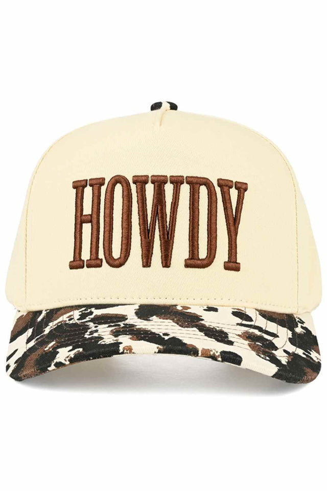 Multi Step into Western charm with this C.C HOWDY Embroidered Letter Trucker Hat. Featuring bold "HOWDY" embroidery paired with eye-catching cow print details, this classic snapback delivers laid-back style with personality. Crafted from 100% cotton for breathability and comfort, the structured trucker design keeps its shape while the adjustable snapback ensures a perfect fit for most head sizes. With a 22.5" circumference, it's designed for all-day wear whether you're hitting the ranch or the city streets.