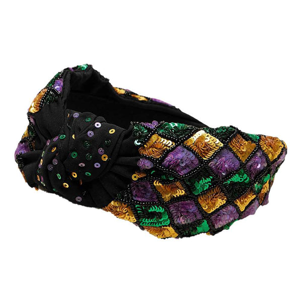 Mardi Gras Sequin Embellished Knot Headband brings a touch of sparkle to your festive attire. Designed with a vibrant color palette and intricate sequin embellishments, it’s an ideal accessory for Mardi Gras celebrations. The comfortable knot design ensures the headband stays securely in place, letting you party in style all day long.