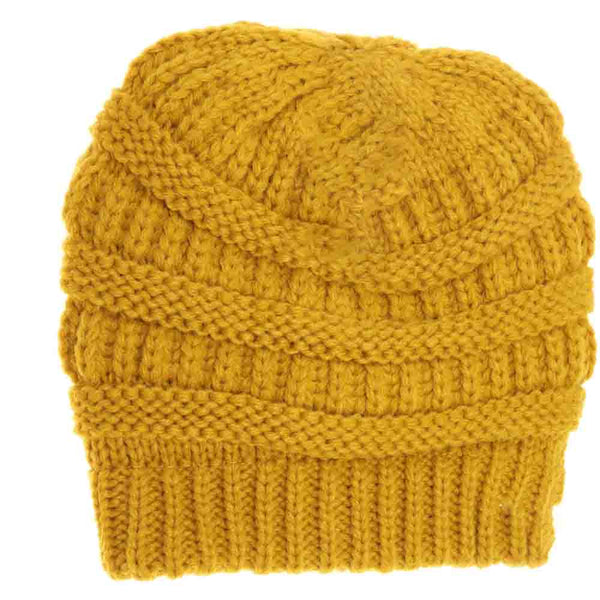 Mustard Kids Solid Fuzzy Lined CC Beanie combines durable construction with a plush interior to provide exceptional warmth and comfort for children. Designed with a secure fit and a minimalist, solid color style, this beanie is perfect for keeping young ones protected from cold weather while supporting active play. Its fuzzy lining enhances insulation without adding bulk, making it an excellent choice for daily wear in colder climates. 