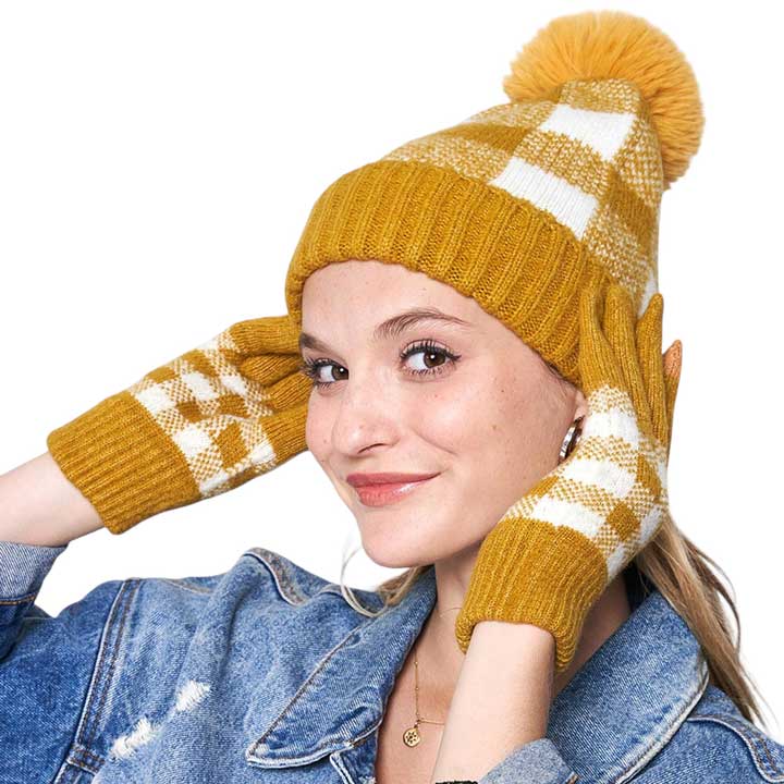 Mustard Buffalo Check Patterned Faux Fur Pom Pom Beanie Hat, is perfect for all weather conditions. Crafted from high-quality faux fur material, this hat is designed to keep you warm and cozy in cold temperatures. It is an ideal choice for gifting to your loved ones in this Christmas season.