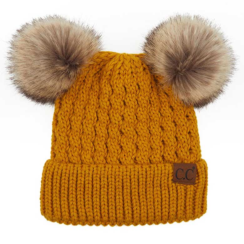 Mustard C.C Double Pom Pom All Over Cable Knit Beanie Hat., Stay warm and cozy this winter. Expertly crafted from a premium cable knit fabric, this stylish beanie provides maximum insulation and breathability. Two pom poms on top add a touch of flair to your look. Perfect for chilly winter days, this is an ideal winter gift. 