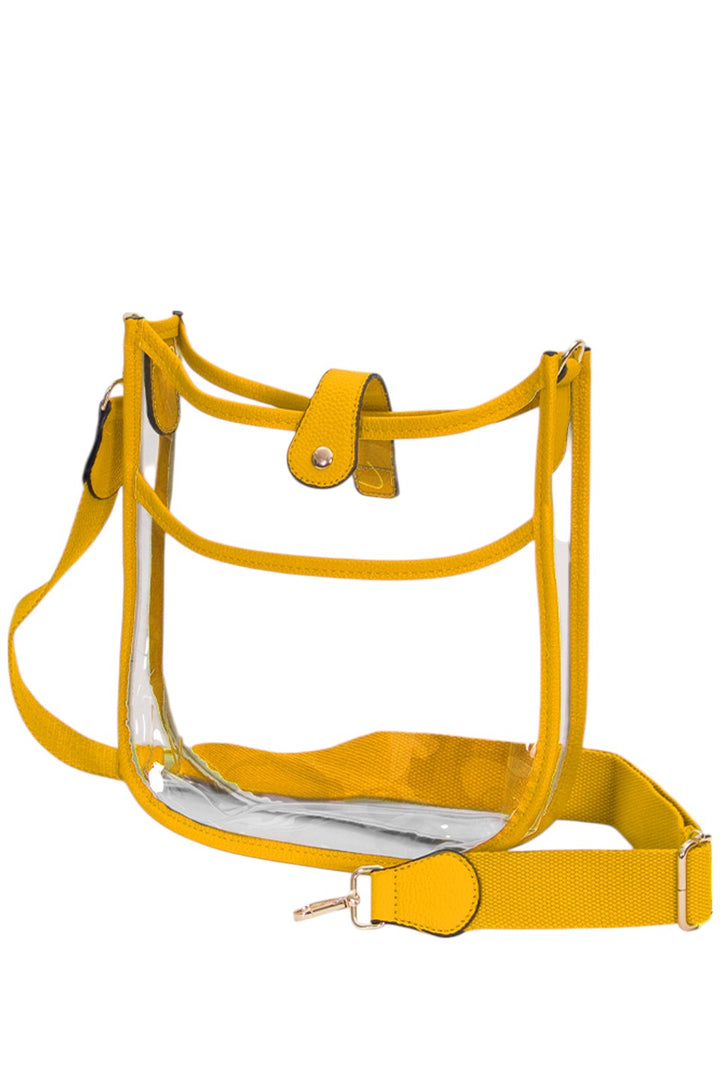 Clear Stadium Concert Crossbody Bag is expertly crafted to comply with strict venue security policies, featuring a fully transparent design for quick inspection. Its lightweight, durable construction ensures comfort and longevity, while the adjustable crossbody strap provides a secure, hands-free fit. Perfectly sized to hold essentials like tickets, phones, and wallets, this bag combines practicality with convenience for seamless access at concerts and stadium events.