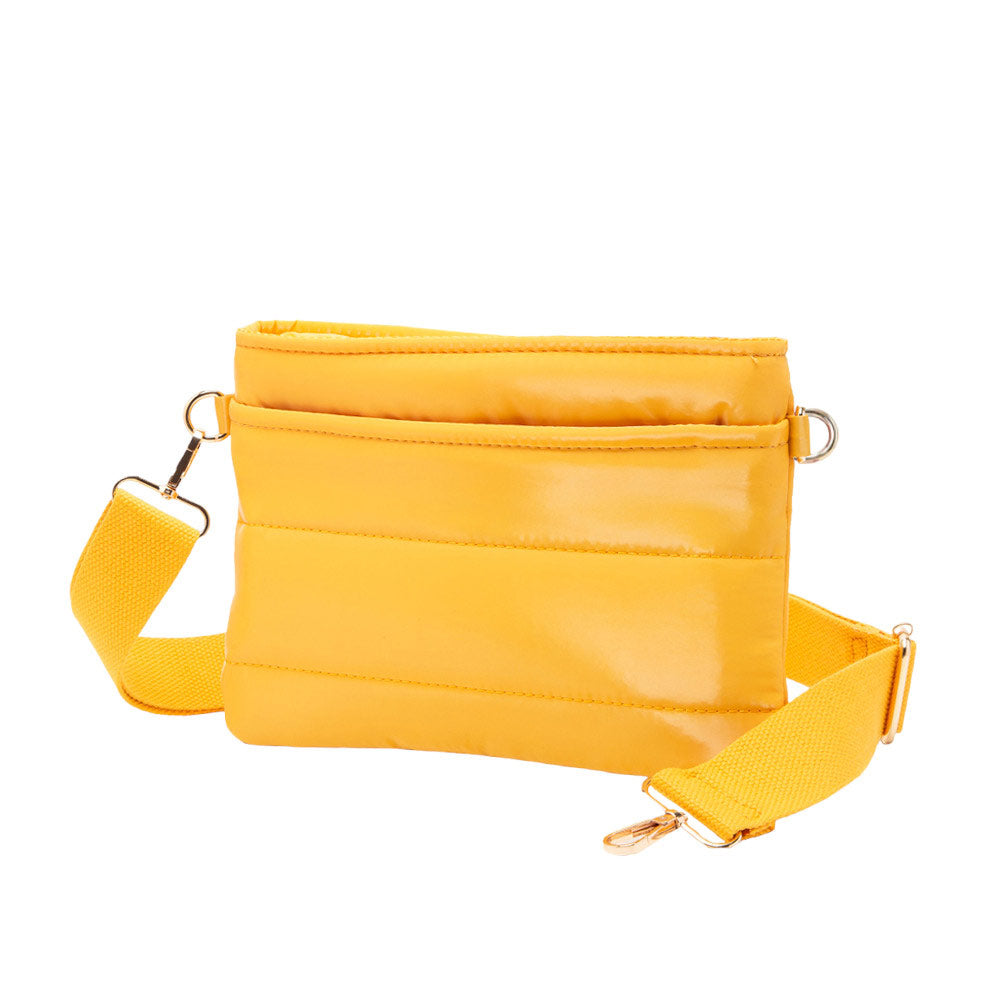 Mustard Glossy Solid Puffer Crossbody Bag, Complete the look of any outfit on all occasions with this Shiny Puffer Crossbody Bag. This Puffer bag offers enough room for your essentials. With a One Front Zipper Pocket, One Back Zipper Pocket, and a Zipper closure at the top, this bag will be your new go-to! The zipper closure design ensures the safety of your property. The widened shoulder straps increase comfort and reduce the pressure on the shoulder.