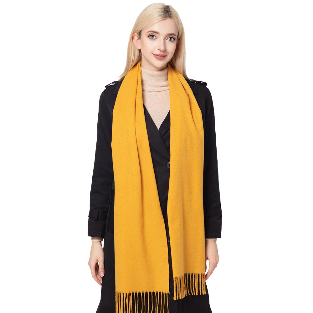 Mustard Gorgeous Solid Oblong Scarf, is delicate, warm, on-trend & fabulous, and a luxe addition to any cold-weather ensemble. This scarf combines great fall style with comfort and warmth. It's a perfect weight and can be worn to complement your outfit or with your favorite fall jacket. Perfect gift for any occasion.