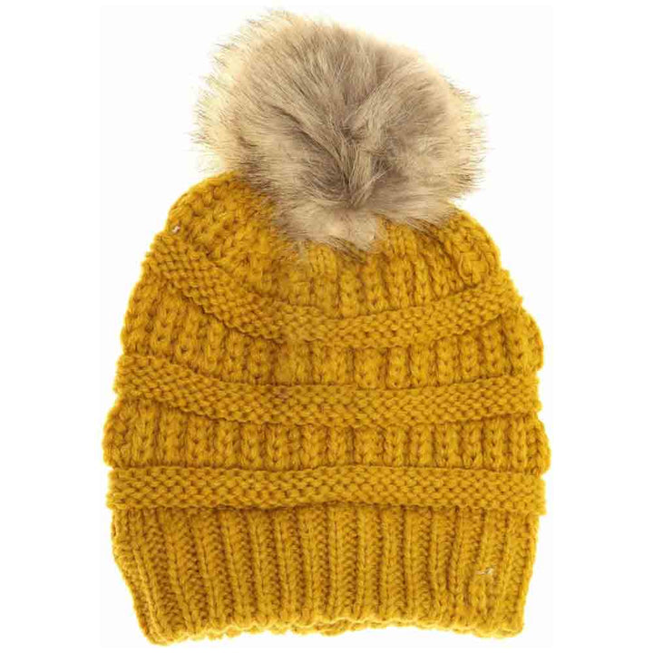 Mustard Kids Fur Pom CC Beanie combines warmth and style with a soft, comfortable fabric that shields young heads from cold weather. Its plush fur pom adds a fashionable accent while maintaining breathability, ensuring all-day comfort and protection during outdoor play or casual outings. Designed for durability and ease of wear, this beanie is an essential winter accessory for active children. 