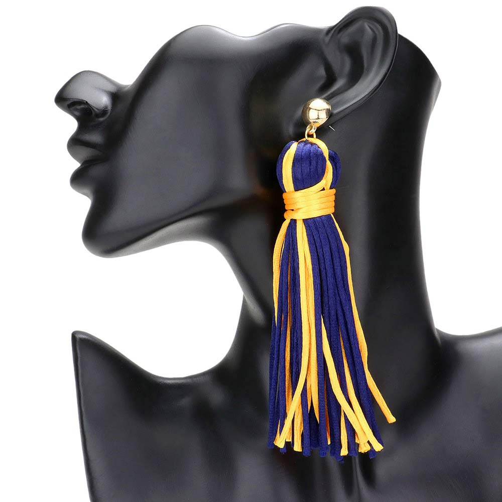 Mustard Navy Yarn Tassel Dangle Earrings, Experience bohemian chic with these. Crafted with soft yarn and adorned with delicate metal accents, these earrings add a touch of playful elegance to any outfit. Embrace your unique style and elevate your look with these stunning statement earrings.