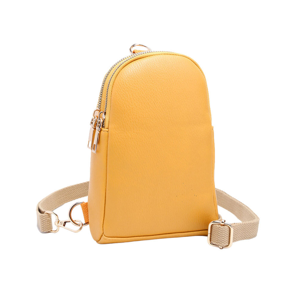 Mustard Solid Faux Leather Sling Bag, is the perfect combination of style and convenience. Crafted from durable faux leather, it can withstand daily wear and tear and its adjustable shoulder strap ensures a comfortable fit. Perfect Birthday Gift, Anniversary Gift, Mother's Day Gift, Graduation Gift, Valentine's Day Gift.