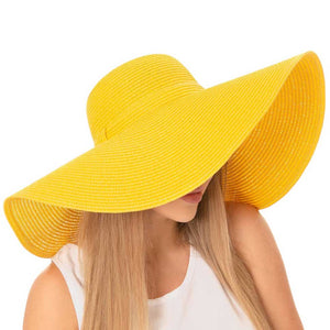 Mustard Solid Floppy Straw Sun Hat, Stay stylish and protected from the sun with our sun hats! Made from high-quality straw, this hat is perfect for any sunny day. Its floppy design not only looks fashionable but also provides ample shade for your face and neck. Don't forget to pack this accessory for your next beach trip!