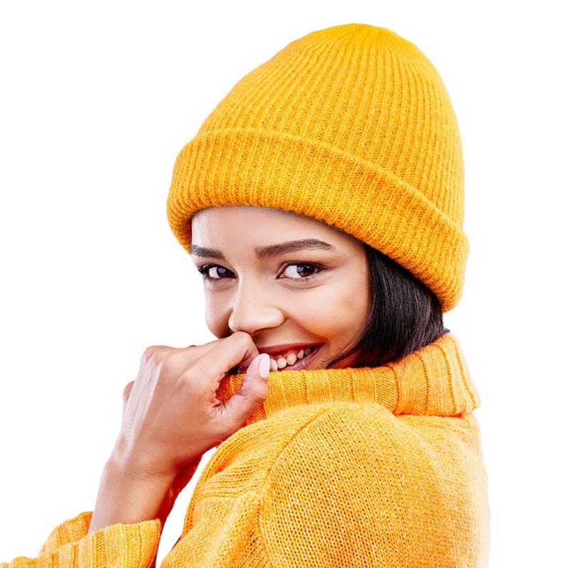 Mustard Solid Knit Beanie Hat, stay warm no matter the weather with this. Crafted from thick, soft knit for superior comfort and insulation, this stylish beanie is perfect for outdoor activities. The lightweight design ensures maximum breathability, making it an ideal choice for long-term wear or making an ideal winter gift.