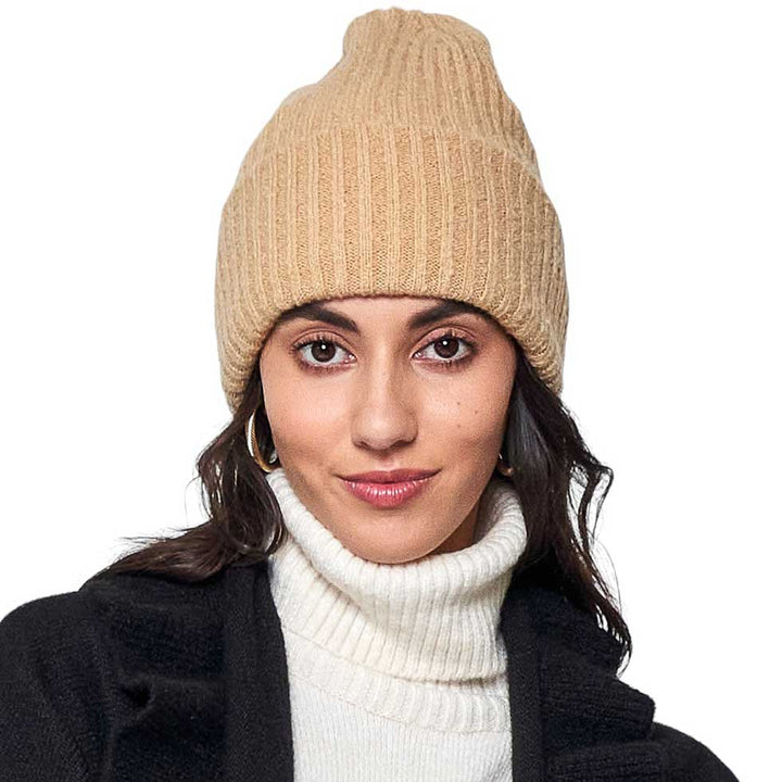 Mustard Solid Knitted Beanie Hat, is crafted with a soft Acrylic material, making it lightweight and comfortable. Its ribbed-knit construction delivers warmth and protection in cool weather. Its one-size-fits-all design makes it a great gift choice for men, women, or children.