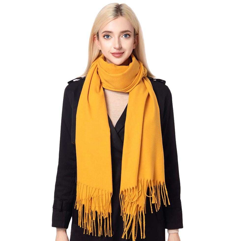 Mustard Solid Oblong Scarf, delicate, warm, on-trend & fabulous, a luxe addition to any cold-weather ensemble. This scarf combines great fall style with comfort and warmth. It's a perfect weight and can be worn to complement your outfit or with your favorite fall jacket. Perfect gift for birthdays, holidays, or any occasion.