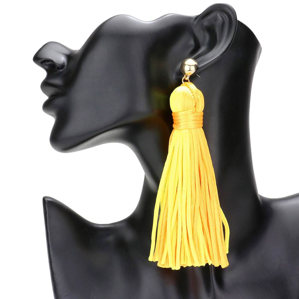 Mustard yellow Yarn Tassel Dangle Earrings, Experience bohemian chic with these. Crafted with soft yarn and adorned with delicate metal accents, these earrings add a touch of playful elegance to any outfit. Embrace your unique style and elevate your look with these stunning statement earrings.