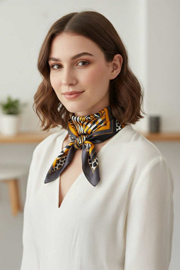 Mustard Elevate your accessory game with this versatile bandana scarf featuring a vibrant multi-animal pattern print. Crafted from 100% lightweight polyester with a silky finish, it's the perfect year-round companion for any outfit or occasion. Measuring 27.5" x 27.5", this square scarf offers endless styling possibilities wear it as a headwrap, neck scarf, or tie it to your bag for an instant fashion statement. The smooth, breathable fabric keeps you comfortable in any season, whether you're layering for w